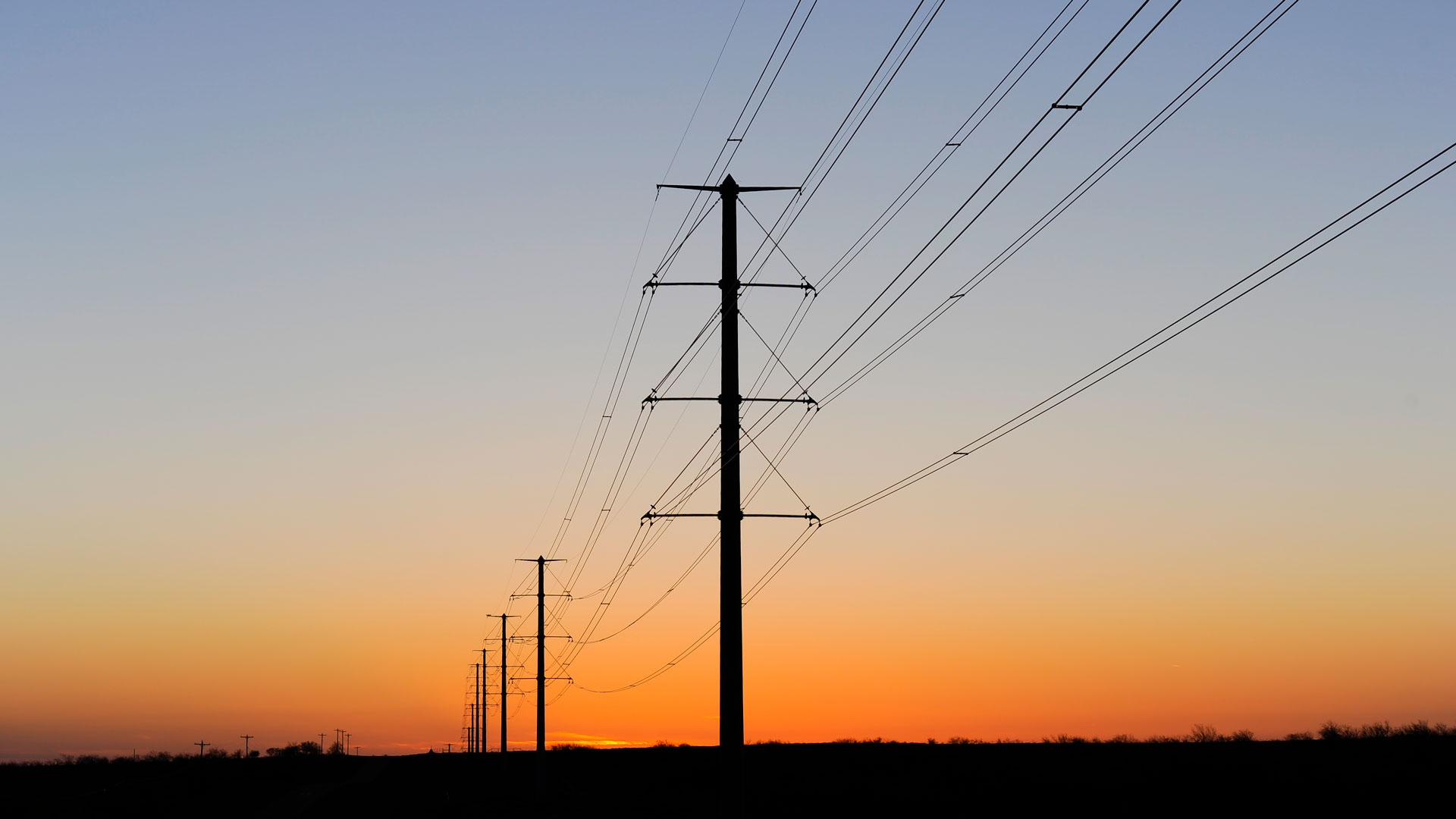 Sunset behind the Lonestar Transmission line